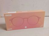 a pink box with a pair of glasses on top of it
