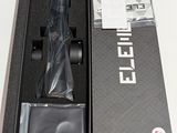 a black box with a black umbrella inside of it