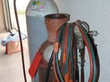 a propanene and hoses on the side of a building