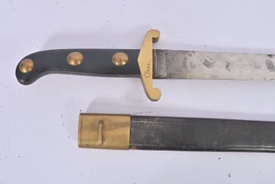 two knives that are sitting side by side on a white surface