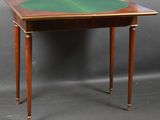 an image of a small table with a green top on a grey background