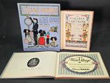 Trois livres pour enfants sont posés sur une table devant un fond noir