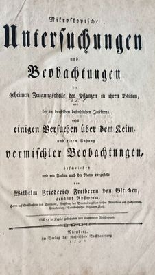 an old book with a black and white title on it