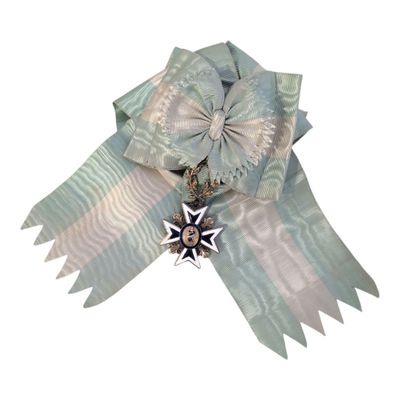 a blue and white ribbon with a star on it
