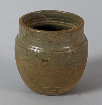 a close up of a vase with a white background