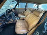 a picture of the interior of a car with leather seats
