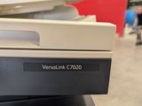 a close up of a printer sitting on top of a table