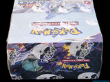 a box of pokemon trading cards sitting on a table