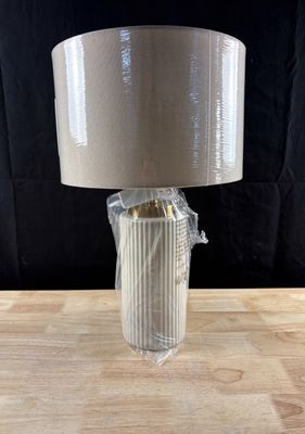 an image of a lamp that is on a table