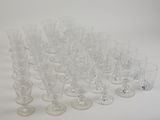 a lot of empty wine glasses on the table