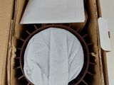 packaging of a box containing a toilet paper and a toilet paper roll