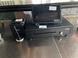 an image of a cash register with a monitor on top of it