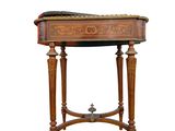 a small wooden table with a drawer on top of it