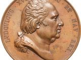 an image of a close up of a coin with a man ' s face on it