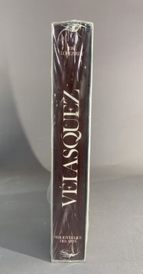 an image of a box of chocolate covered chocolates sitting on a table
