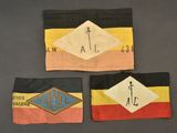 three pieces of cloth with different designs on them on a table