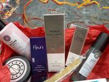 a basket of beauty products sitting on a table