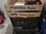 a wooden crate that has some sort of items inside of it