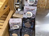 several boxes of cookies stacked on top of each other in a store