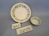 an image of a green and white dinner set on a table