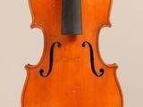 an old violin with a bow on a white background