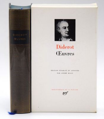 two books sitting next to each other on a white surface