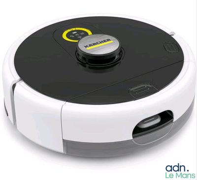 une image d'un aspirateur robotisé sur une surface blanche