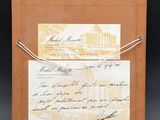 an old wooden tray with a note and a piece of paper on it
