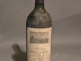 a bottle of wine that is sitting on a table