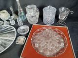 a table with a lot of glass items on it