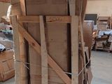 a stack of boxes sitting on top of a pallet in a warehouse