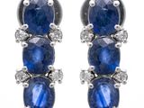 a pair of sapphire and diamond earrings