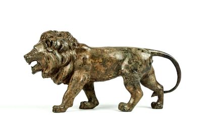 bronze statue of a lion on a white background