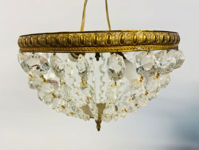a chandelier hanging from the ceiling in a room