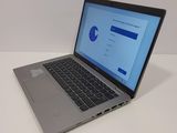 a laptop that is sitting on a table