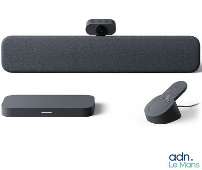 an image of a set of speakers and a remote on a white surface