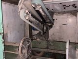 an old machine that is in a dirty room