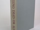 the front cover of a book with a red writing on it