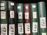 many books on a shelf with asian writing on them