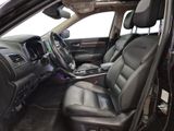 the interior of a car with black leather seats and dashboard