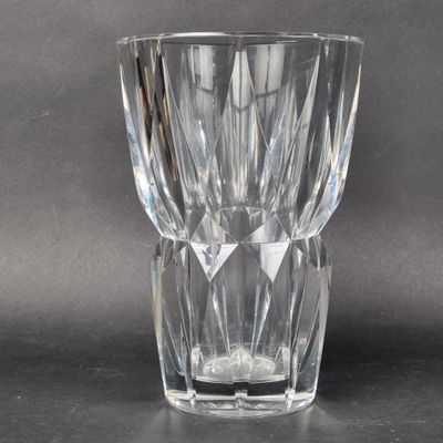 a clear glass that is sitting on a table