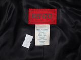 a black jacket with a red label on it