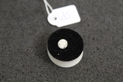 a small black box with a white diamond on it