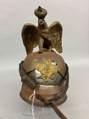 a helmet with an eagle on top of it