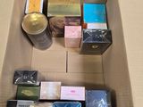 a cardboard box filled with different types of soaps