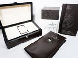 a box with a ring inside of it and a box with a ring inside of it