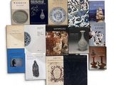 a lot of books that are sitting on a table