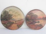 two plates with a painting of a man and a dog on a dirt road