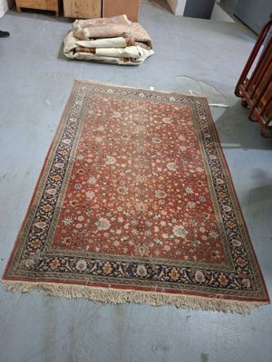 a large rug on the floor in a room