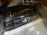 a baseball bat that is sitting in a box
